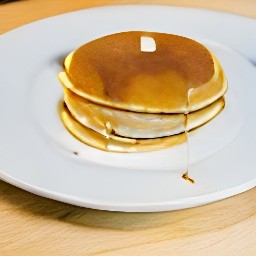 the pancake is transferred to a plate and maple syrup is drizzled over it.