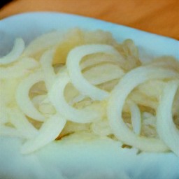 the onions are transferred to a plate.