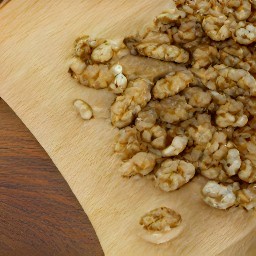 the walnuts are chopped into smaller pieces.