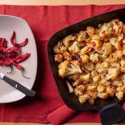 

Cauliflower and potatoes is a delicious vegan, gluten-free, eggs-free, lactose-free side dish stew made from cauliflower, potatoes and red chili peppers.