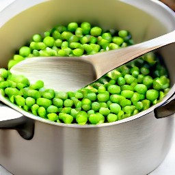a saucepan of peas with lemon and tarragon.
