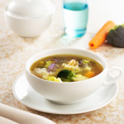 

This vegan, gluten-free, eggs-free and lactose-free rustic vegetable soup is a hearty dinner option made from onions, red lentils, vegetable broth, leeks, cauliflower and zucchini.