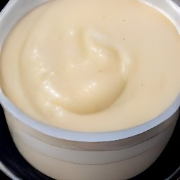 the cheese mixture is transferred to a container.