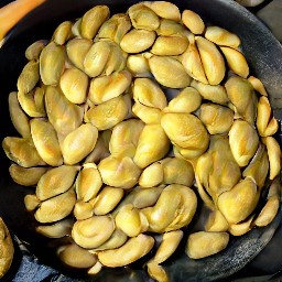 a mixture of roasted seeds and spice mix that has been stirred for two minutes.