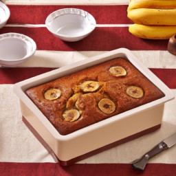 

Banana cake is a delicious and nut-free, soy-free, lactose-free dessert made with margarine, eggs, granulated sugar, bananas and all purpose flour.
