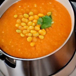 a pot of chili with cheese.