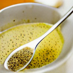 a dressing made from italian seasoning, olive oil, garlic powder, black pepper, and salt.