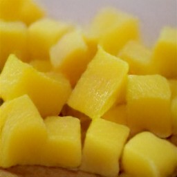a peeled and cut pineapple.