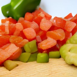 diced tomatoes, cut and deseeded green bell peppers, and peeled and diced cucumbers.