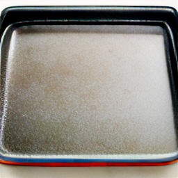 the baking sheet is now coated with a thin layer of cooking spray.