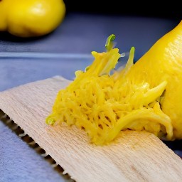 the zester will remove the lemon zest from the lemon in long, thin strips.