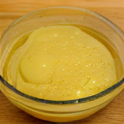 a bowl of butter and sugar that has been microwaved for 1 minute on low heat.