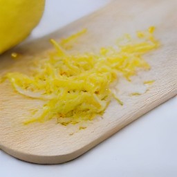 the zester will remove the lemon's outermost layer, which is full of flavor.