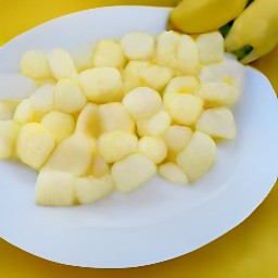 a plate of small banana pieces.