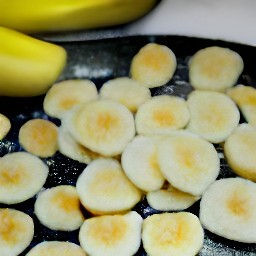 a flipping sound followed by sugared bananas.