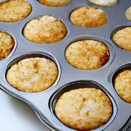 the muffin tin is removed from the oven and the heat is turned off.