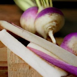 turnips that are trimmed and cut into sticks.