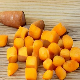 a peeled and cubed sweet potato.