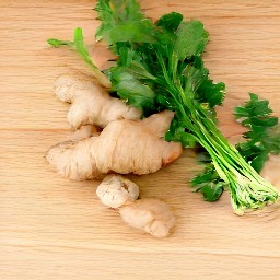 the cilantro is chopped and the ginger is sliced.