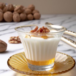 

This delicious, European-style Greek yogurt is gluten-free, eggs-free and soy-free. Enjoy a nutritious snack of plain yogurt with crunchy walnuts and sweet honey!