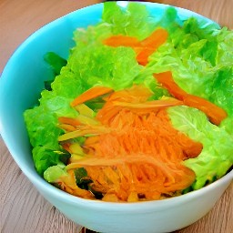 a bowl of lettuce leaves with salt sprinkled on top.