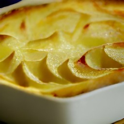 the dish now contains potatoes dauphinoise that are no longer covered.
