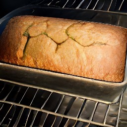 a loaf of bread baked in an oven for 60 minutes.