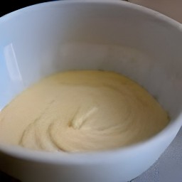 the dry mixture is transferred to the banana mixture and whisked to get a batter.