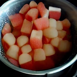 watermelon rind that has been soaked in brine for 30 minutes and then drained in a colander.