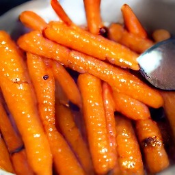 a saucepan of carrots cooked in butter, brown sugar, and ranch dressing mix.