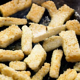 a pan of crispy tofu strips.