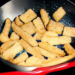 the soy sauce mixture is poured into the pan and mixed with a spoon.
