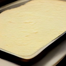the dough will spread into a jelly roll pan, and when pricked with a fork, holes will appear.