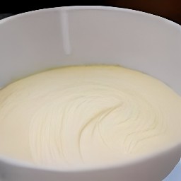 the egg mixture is transferred to the dry mixture and whisked to get a batter.