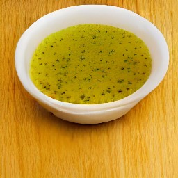 the output is a bowl of italian dressing, minced garlic, and olive oil mixed together.
