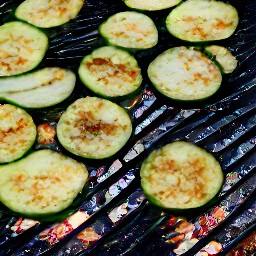 the zucchini is now flipped over and will continue to cook on the other side.