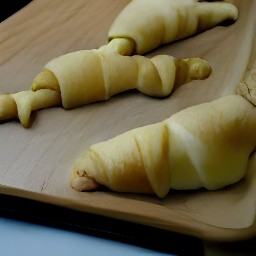 12 crescent rolls filled with cherry pie filling.