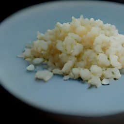 garlic and onion that are peeled and chopped.