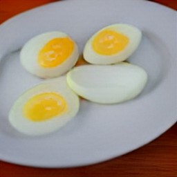 the egg slices are transferred to a plate.