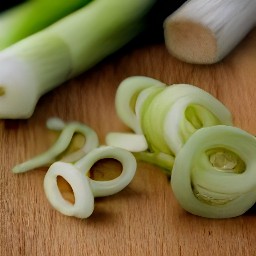 after peeling and chopping the garlic, slice the leeks.
