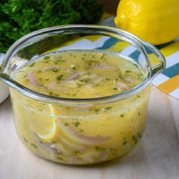 

Lemon vinaigrette dressing is a vegan, gluten-free, egg-free, nut-free, soy-free and lactose free flavour enhancer made of olive oil.