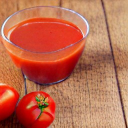 a bowl of tomato sauce and water mixed together.