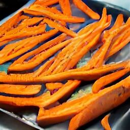 after mixing the sweet potatoes with a spoon, the baking sheet is placed in the oven. after 15 minutes have passed, the baking sheet is taken out of the oven and stirred once more before being placed back in for another 15 minutes.