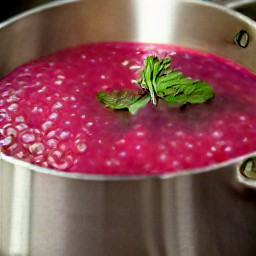 a soup with onions, garlic, beets, vegetable broth, salt and black pepper.