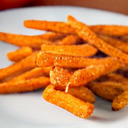 the baked sweet potato fries are served on a plate.