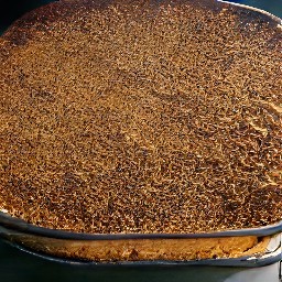 a baked dish with a cinnamon mixture on top.