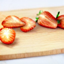a bowl of sliced strawberries.
