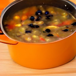 a pot of mixed vegetables, minestrone soup, and black beans.