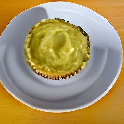 two pie dishes, each with a layer of lentils mixture and mashed veg, topped with grated hard cheese.