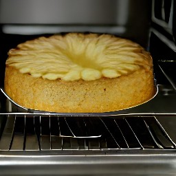 the pineapple cake is done and has been removed from the oven.